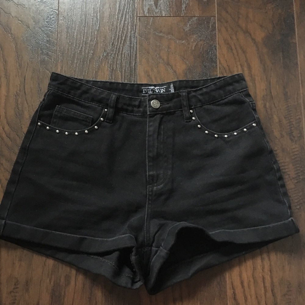 High waisted black denim shorts with stud accents